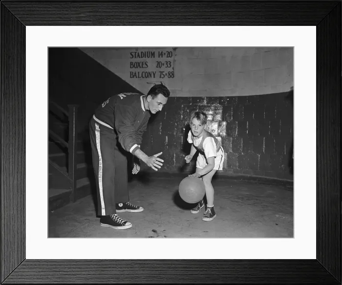 Framed Print : Bob Cousy Coaching Young Boy Framed Print : Bob Cousy Coaching Young Boy