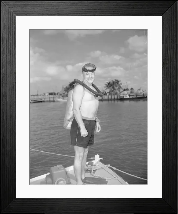 Framed Print : 52 Year Old Lawyer Attempts Record Dive
