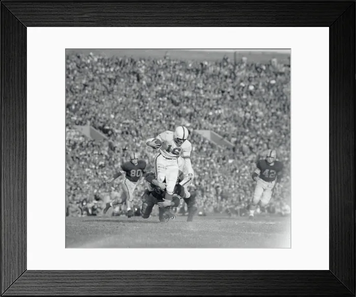 Framed Print : Football Player Tackling His Opponent Framed Print : Football Player Tackling His Opponent