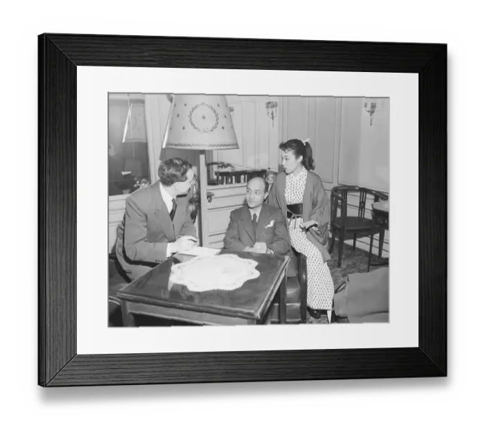 Framed Print : UPI Journalist Interviewing Japanese Actress and Her American Husband Framed Print : UPI Journalist Interviewing Japanese Actress and Her American Husband