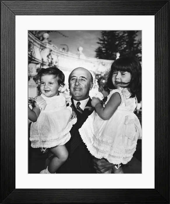 Framed Print : Girls Pose Happily In Arms Of Grandpa Framed Print : Girls Pose Happily In Arms Of Grandpa
