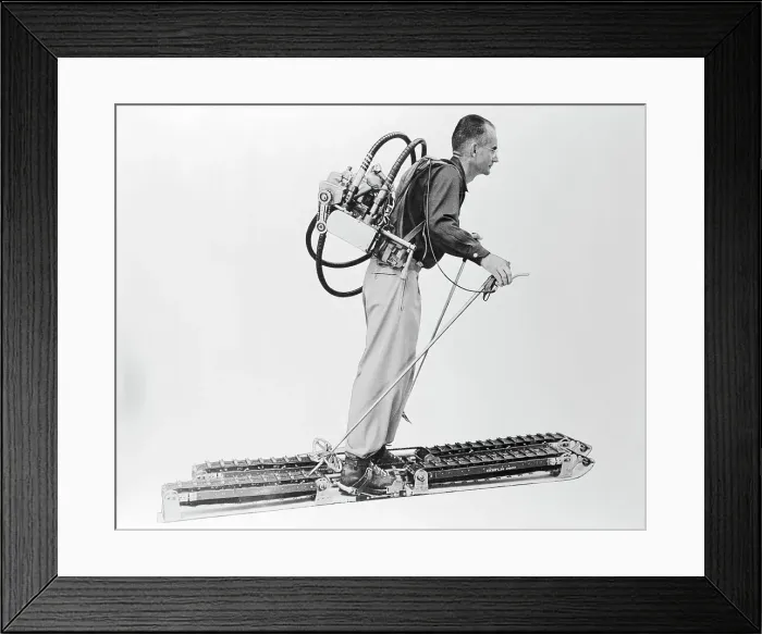 Framed Print : Inventor Displaying His Motor Powered Skis