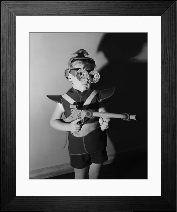 Framed Print : Boy Wearing Spacesuit Costume with Toy Gun Framed Print : Boy Wearing Spacesuit Costume with Toy Gun