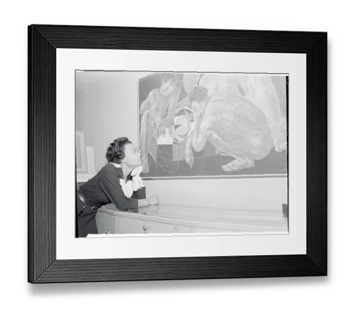 Framed Print : Eartha Kitt Studying a Painting Framed Print : Eartha Kitt Studying a Painting