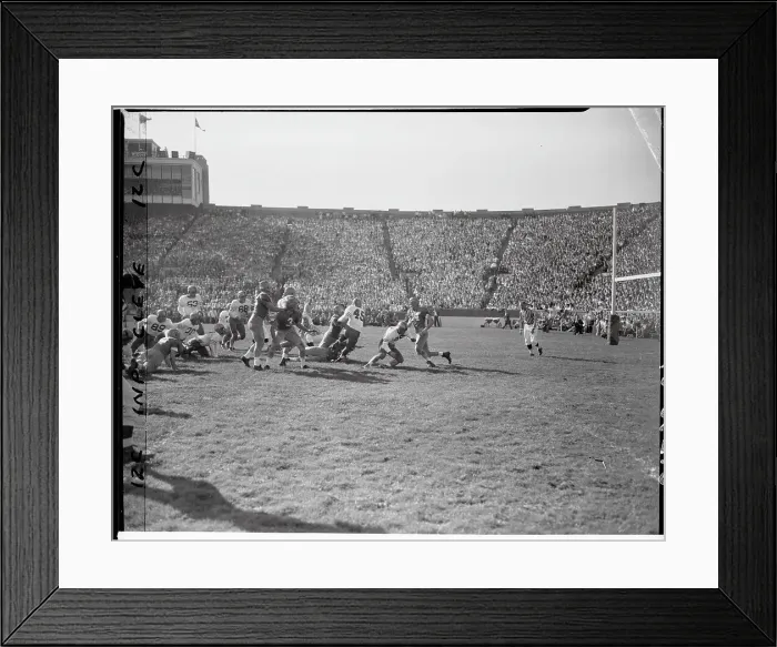 Framed Print : Bob Epps Making Play with Menil Mavraides and Johnny Lattner Framed Print : Bob Epps Making Play with Menil Mavraides and Johnny Lattner