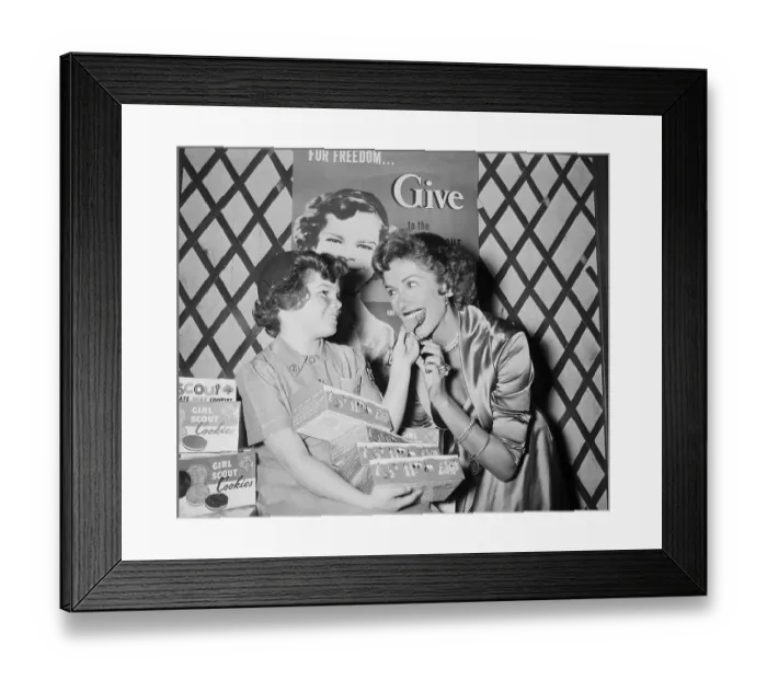 Framed Print : Girl Scout Giving Cookie To Jinx Falkenburg Framed Print : Girl Scout Giving Cookie To Jinx Falkenburg