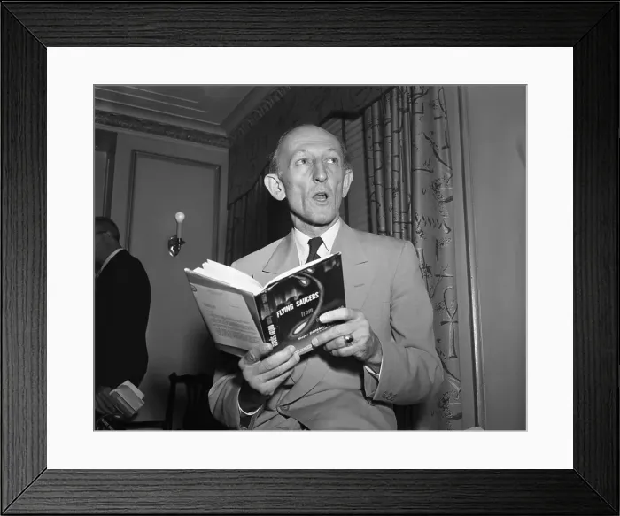 Framed Print : Donald E. Keyhoe Holding UFO Book Framed Print : Donald E. Keyhoe Holding UFO Book