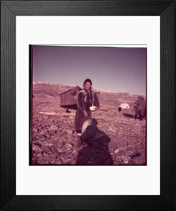 Framed Print : Eskimo Mother Carrying Utensils