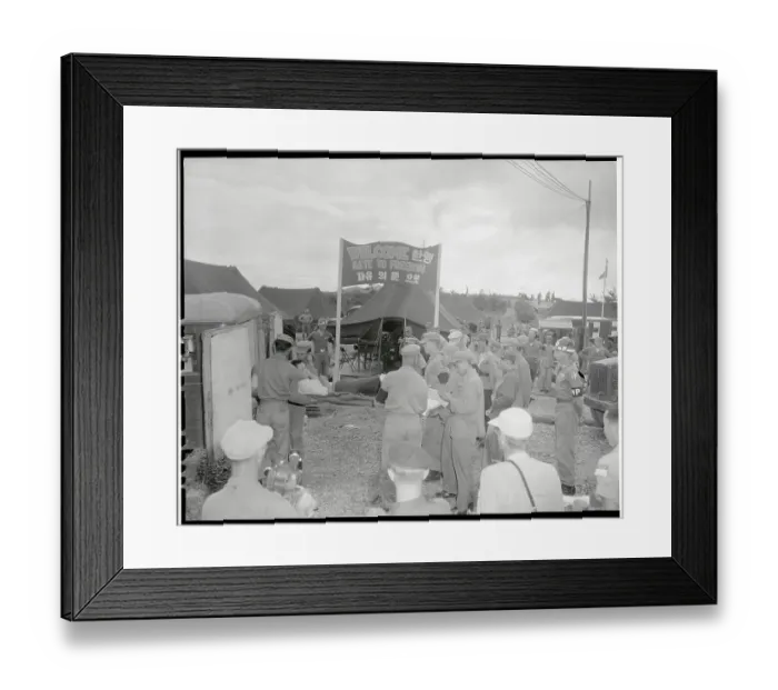 Framed Print : Injured Soldier Being Taken into Outdoor Medical Unit Framed Print : Injured Soldier Being Taken into Outdoor Medical Unit