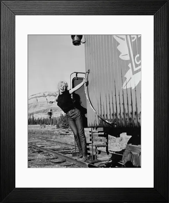 Framed Print : Marilyn Monroe with One Arm on Caboose Framed Print : Marilyn Monroe with One Arm on Caboose