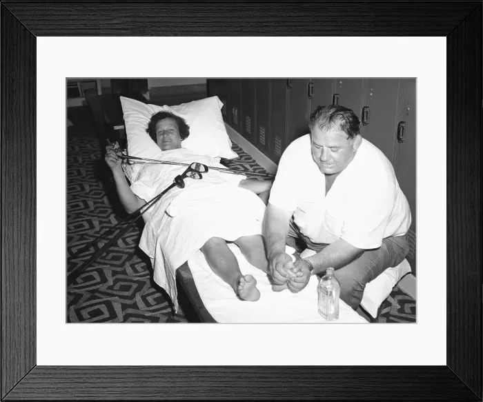 Framed Print : George Zaharias Massaging Babe Didrikson's Feet Framed Print : George Zaharias Massaging Babe Didrikson's Feet