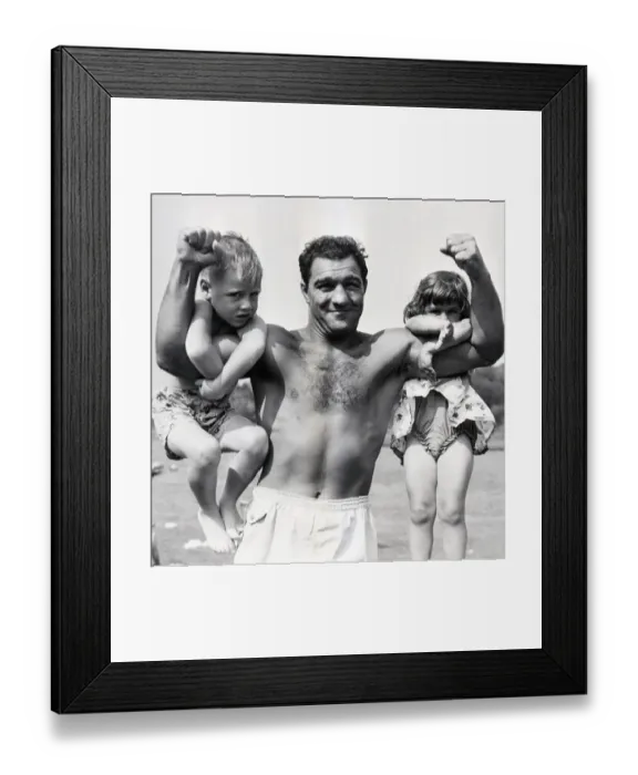 Framed Print : Rocky Marciano with Kids Clinging To Muscle Framed Print : Rocky Marciano with Kids Clinging To Muscle