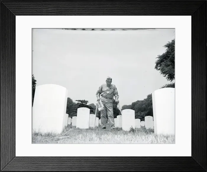Framed Print : Soldier In Cemetery With Newspaper Framed Print : Soldier In Cemetery With Newspaper