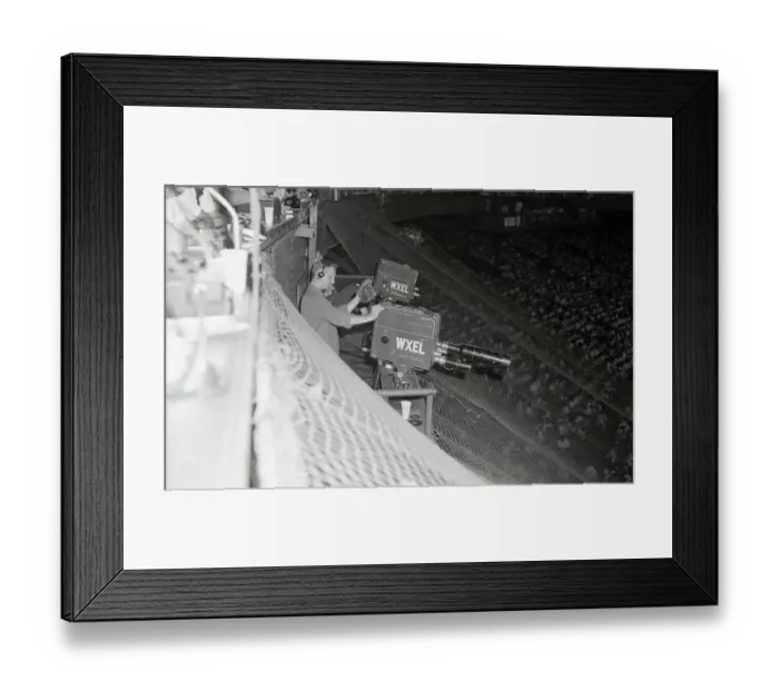 Framed Print : Cameraman Positioning Himself at Stadium Framed Print : Cameraman Positioning Himself at Stadium