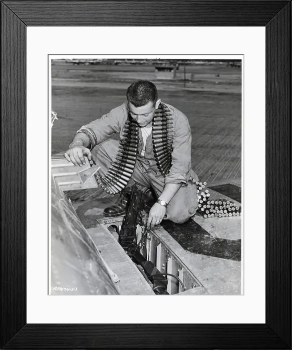 Framed Print : Man Cleans & Checks Machine Guns Framed Print : Man Cleans & Checks Machine Guns