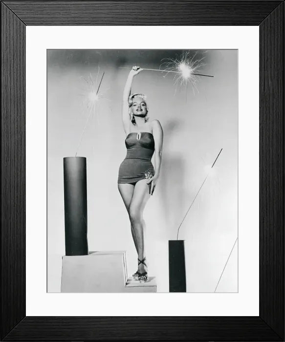 Framed Print : Marilyn Monroe Posing with Large Sparklers Framed Print : Marilyn Monroe Posing with Large Sparklers