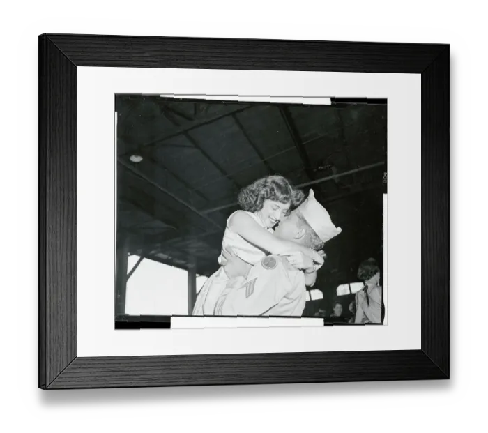 Framed Print : Corporal Howard Ross Hugging His Wife