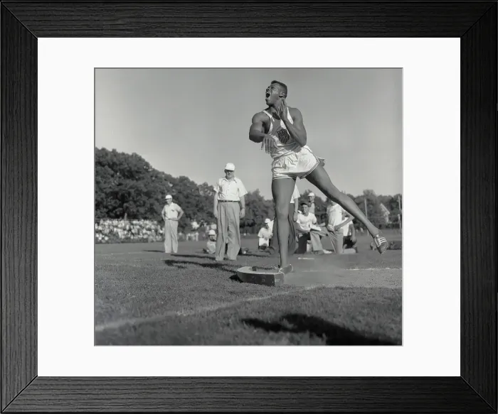 Framed Print : Milt Campbell in Shot Put Throwing Position