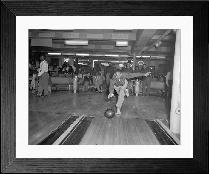 Framed Print : Man Bowling in Harlem Alley Framed Print : Man Bowling in Harlem Alley