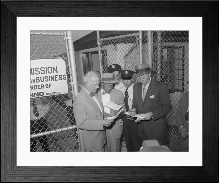 Framed Print : Guards Looking at Bob Considine's Credentials Framed Print : Guards Looking at Bob Considine's Credentials