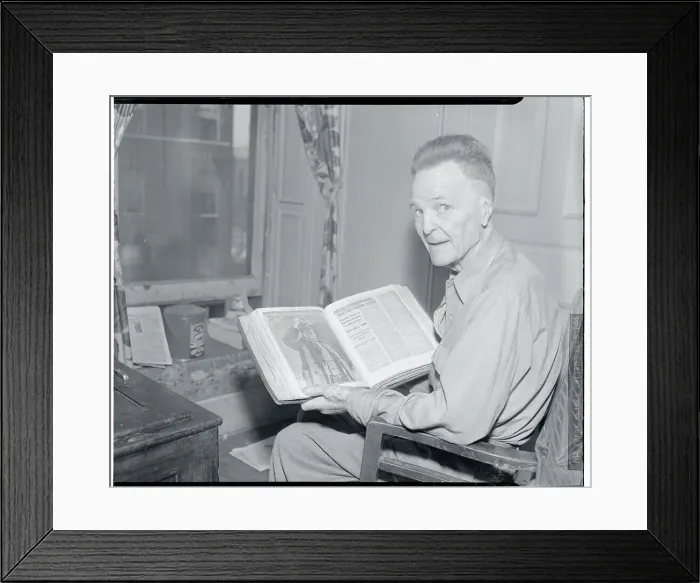 Framed Print : Battling Nelson Looking Through Book Framed Print : Battling Nelson Looking Through Book