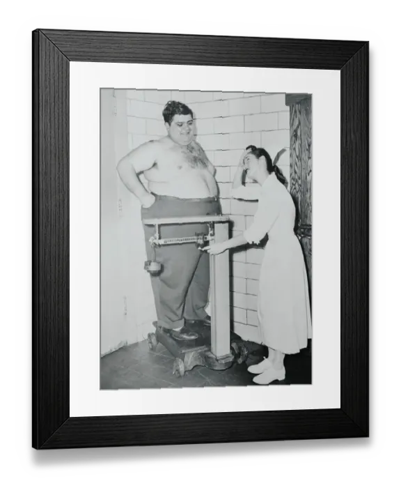 Framed Print : Nurse Weighing Overweight Patient Framed Print : Nurse Weighing Overweight Patient