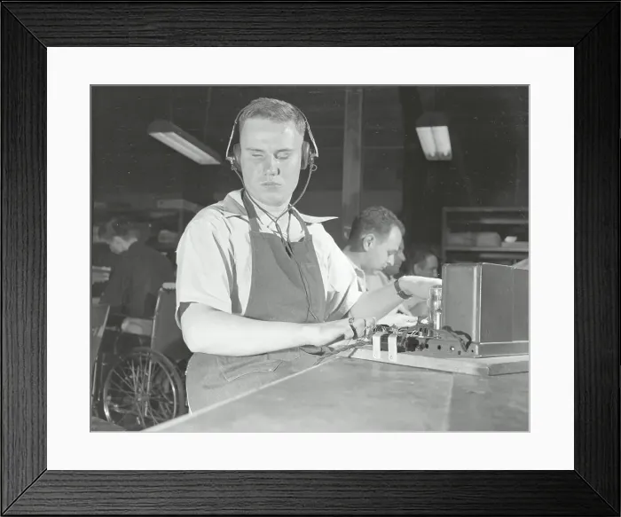 Framed Print : Blind Worker Testing Electronic Device Framed Print : Blind Worker Testing Electronic Device