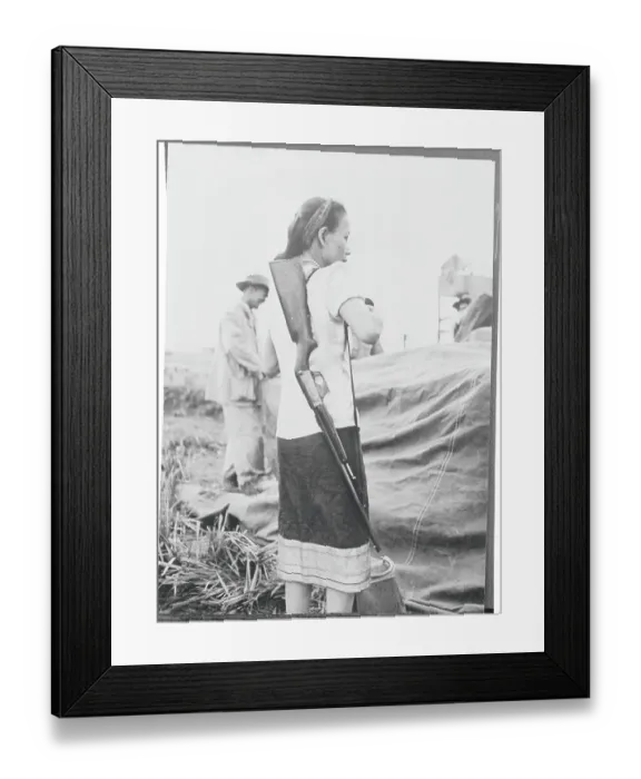 Framed Print : Woman Carrying Rifle on Shoulder Framed Print : Woman Carrying Rifle on Shoulder