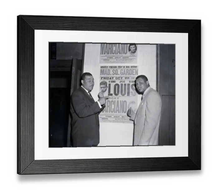 Framed Print : Joe Louis Points to Old Fight Poster Framed Print : Joe Louis Points to Old Fight Poster