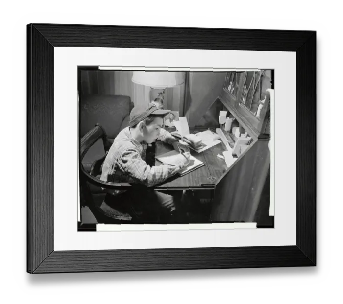 Framed Print : Newsboy Writing Record of Paper Deliveries Framed Print : Newsboy Writing Record of Paper Deliveries