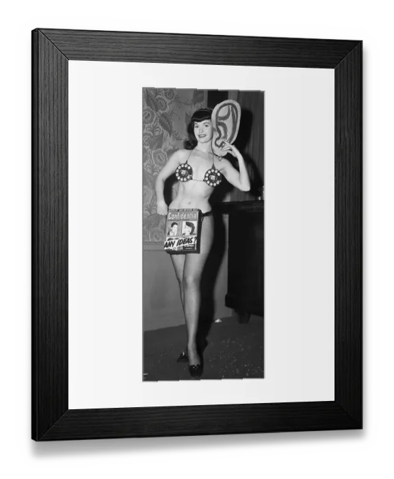 Framed Print : Bettie Page in a Revealing Outfit Framed Print : Bettie Page in a Revealing Outfit