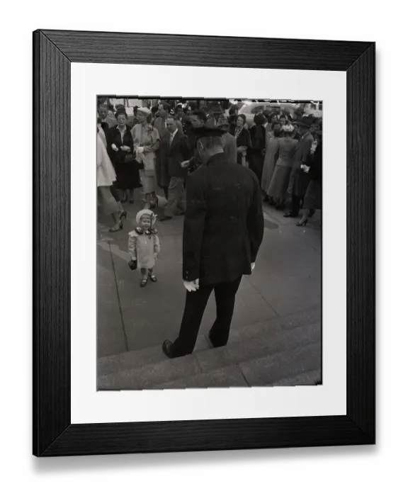 Framed Print : Girl In Dress Looking Up At Policeman Framed Print : Girl In Dress Looking Up At Policeman