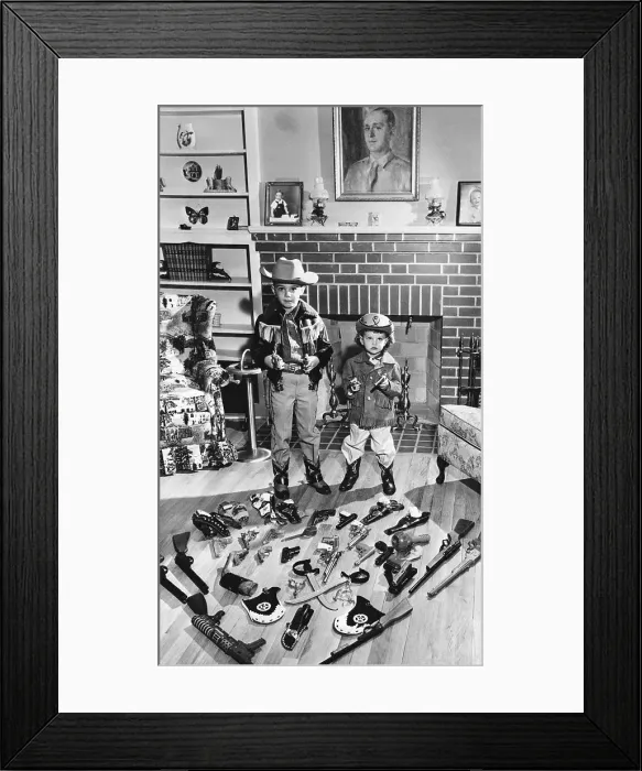 Framed Print : Children Playing as Cowboys with Weapons