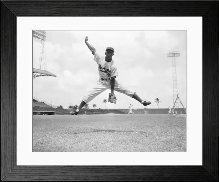 Framed Print : Junior Gilliam Jumping With His Legs Spread Framed Print : Junior Gilliam Jumping With His Legs Spread