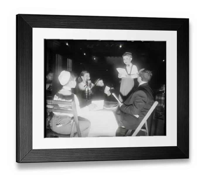 Framed Print : Preview Seder: Boy Stands On Table, Reads Framed Print : Preview Seder: Boy Stands On Table, Reads