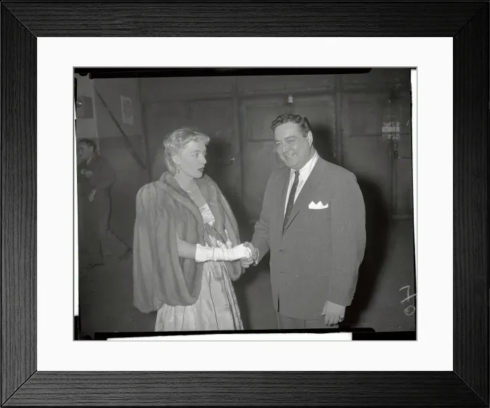 Framed Print : Jackie Gleason Holding Hand of Christine Jorgensen Framed Print : Jackie Gleason Holding Hand of Christine Jorgensen