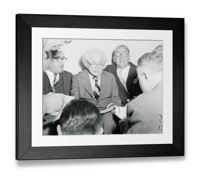 Framed Print : Albert Einstein Reading Statement to Press Framed Print : Albert Einstein Reading Statement to Press