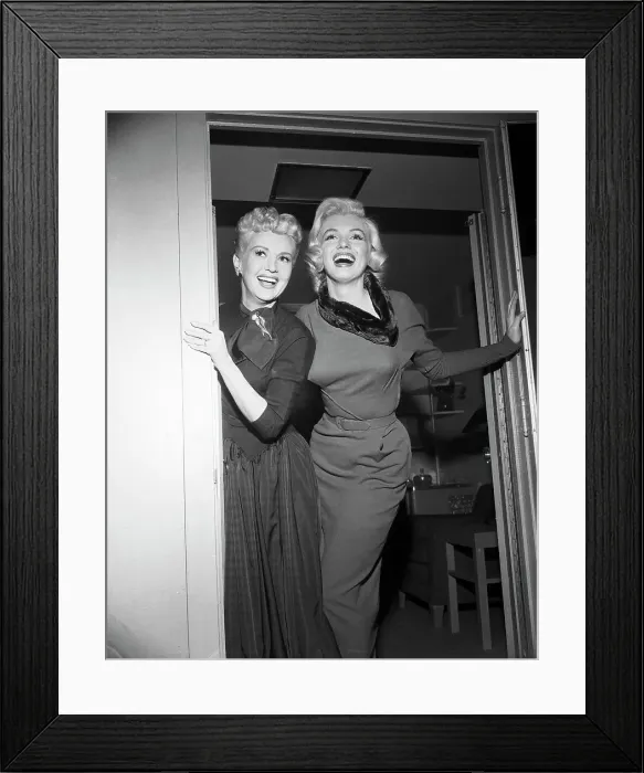 Framed Print : Betty Grable and Marilyn Monroe Standing in Doorway Together Framed Print : Betty Grable and Marilyn Monroe Standing in Doorway Together