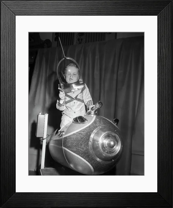 Framed Print : Little Boy on Spaceship Ride Framed Print : Little Boy on Spaceship Ride