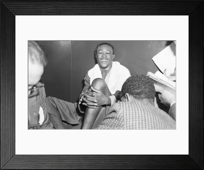 Framed Print : Kid Gavilan Smiling, Hands Around Knee Framed Print : Kid Gavilan Smiling, Hands Around Knee
