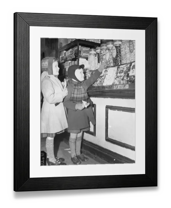 Framed Print : Girls Choosing Candy from Jar Displays Framed Print : Girls Choosing Candy from Jar Displays