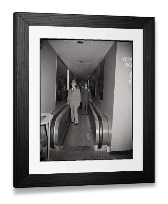 Framed Print : Goodrich Officials on Moving Sidewalk Framed Print : Goodrich Officials on Moving Sidewalk