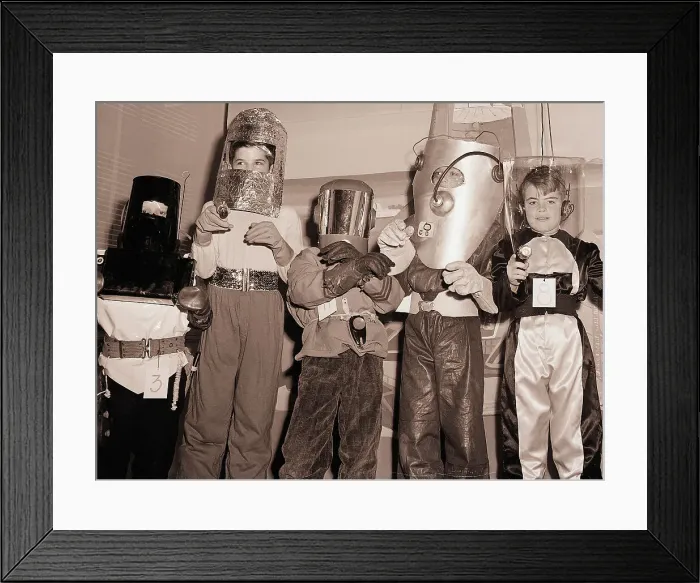 Framed Print : Boys Act Tough and Model Their Spacesuits Framed Print : Boys Act Tough and Model Their Spacesuits