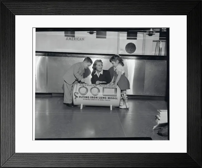Framed Print : Woman and Youngsters Posing with Iron Lung Replica Framed Print : Woman and Youngsters Posing with Iron Lung Replica