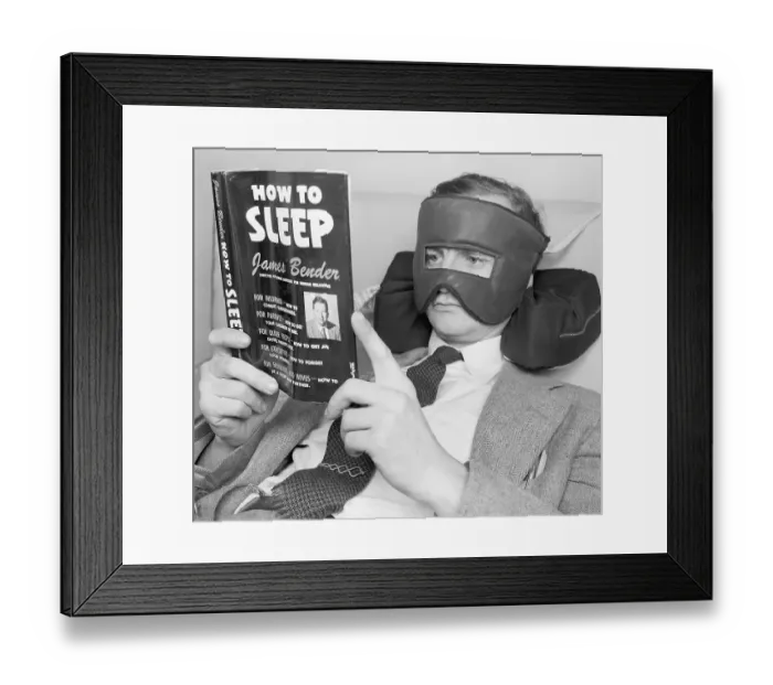 Framed Print : Wally Cox Wears Face Mask While Reading Framed Print : Wally Cox Wears Face Mask While Reading