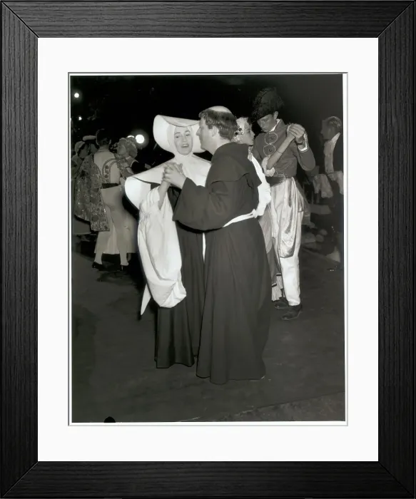 Framed Print : Party Goers Wearing Religious Costumes Framed Print : Party Goers Wearing Religious Costumes