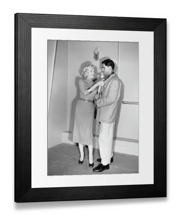 Framed Print : Marilyn Monroe Adjusting Jacket of Al Carmichael Framed Print : Marilyn Monroe Adjusting Jacket of Al Carmichael