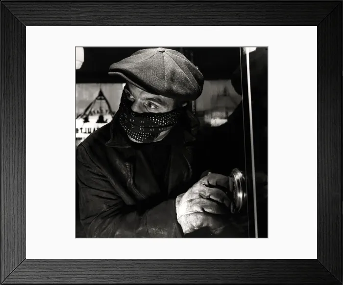 Framed Print : Masked Man Cracking a Safe Framed Print : Masked Man Cracking a Safe