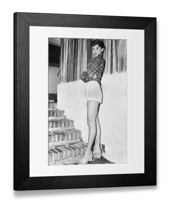 Framed Print : Audrey Hepburn Wearing Shorts at Bottom of Steps