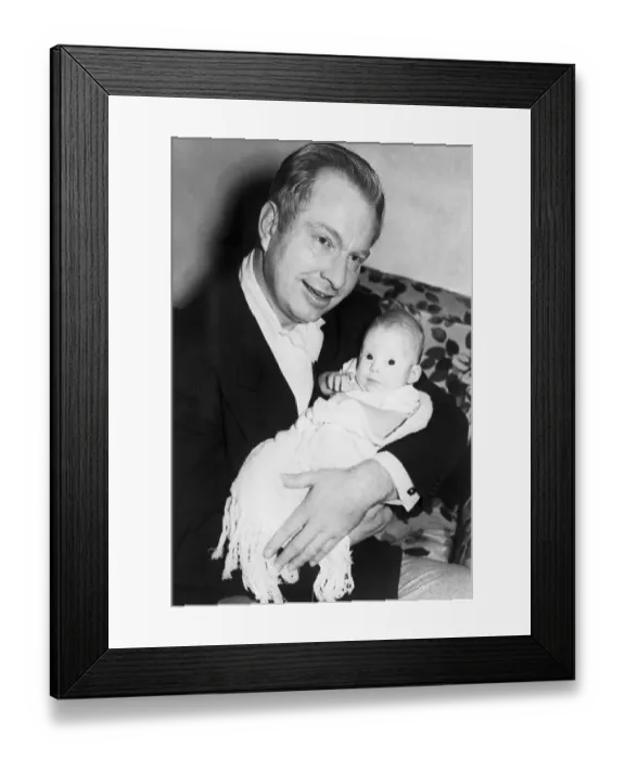 Framed Print : Writer L. Ron Hubbard Holding His Infant Daughter Framed Print : Writer L. Ron Hubbard Holding His Infant Daughter